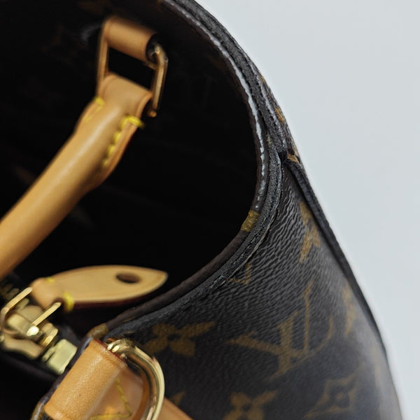 MONTAIGNE Monogram Coated Canvas Brown