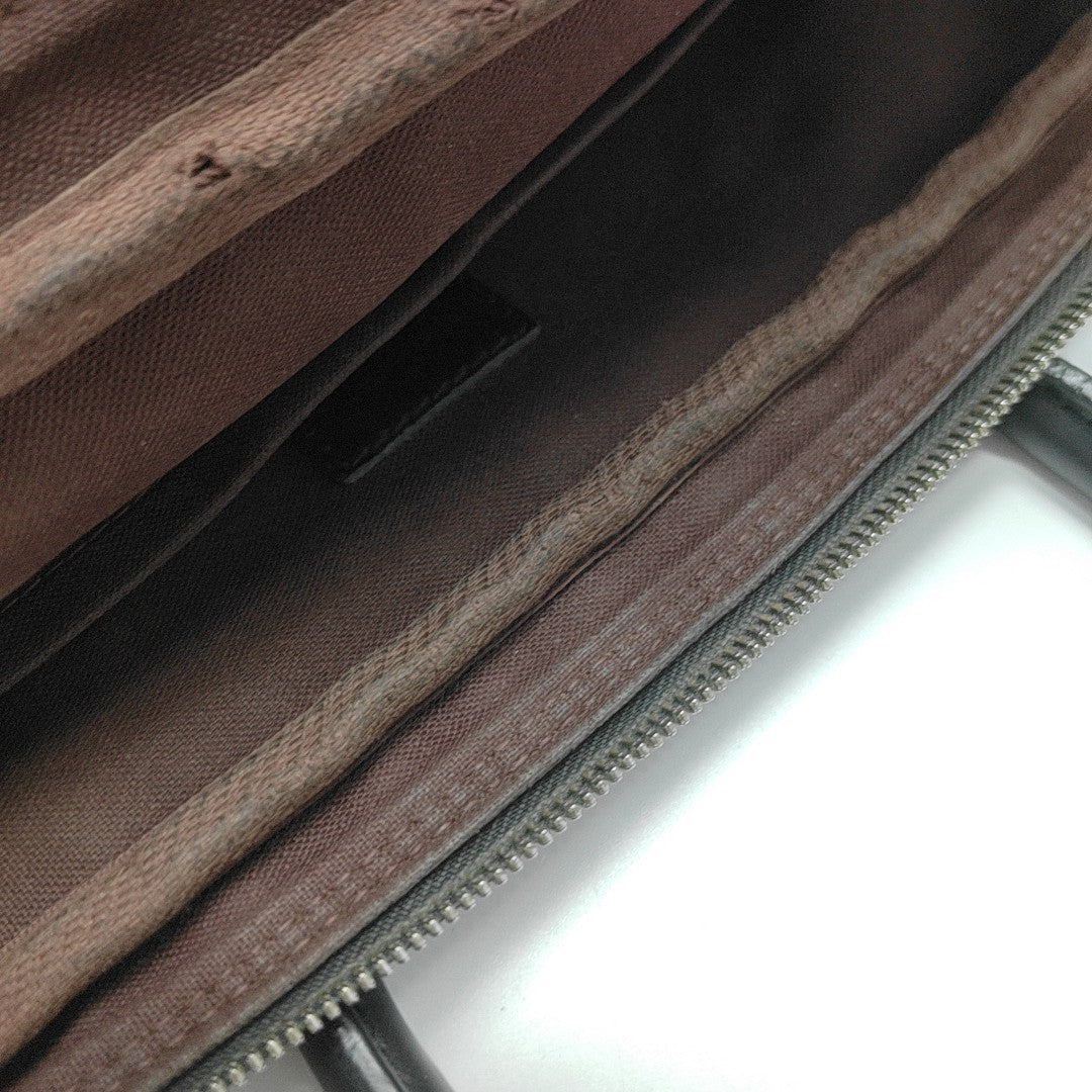 PORTE-DOCUMENTS PM Monogram Coated Canvas Brown