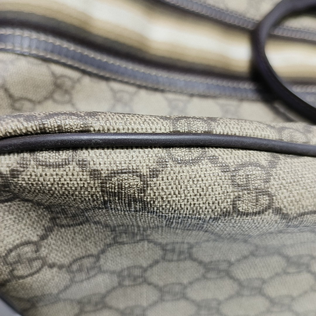 Monogram Coated Canvas Top Handle Bag Brown