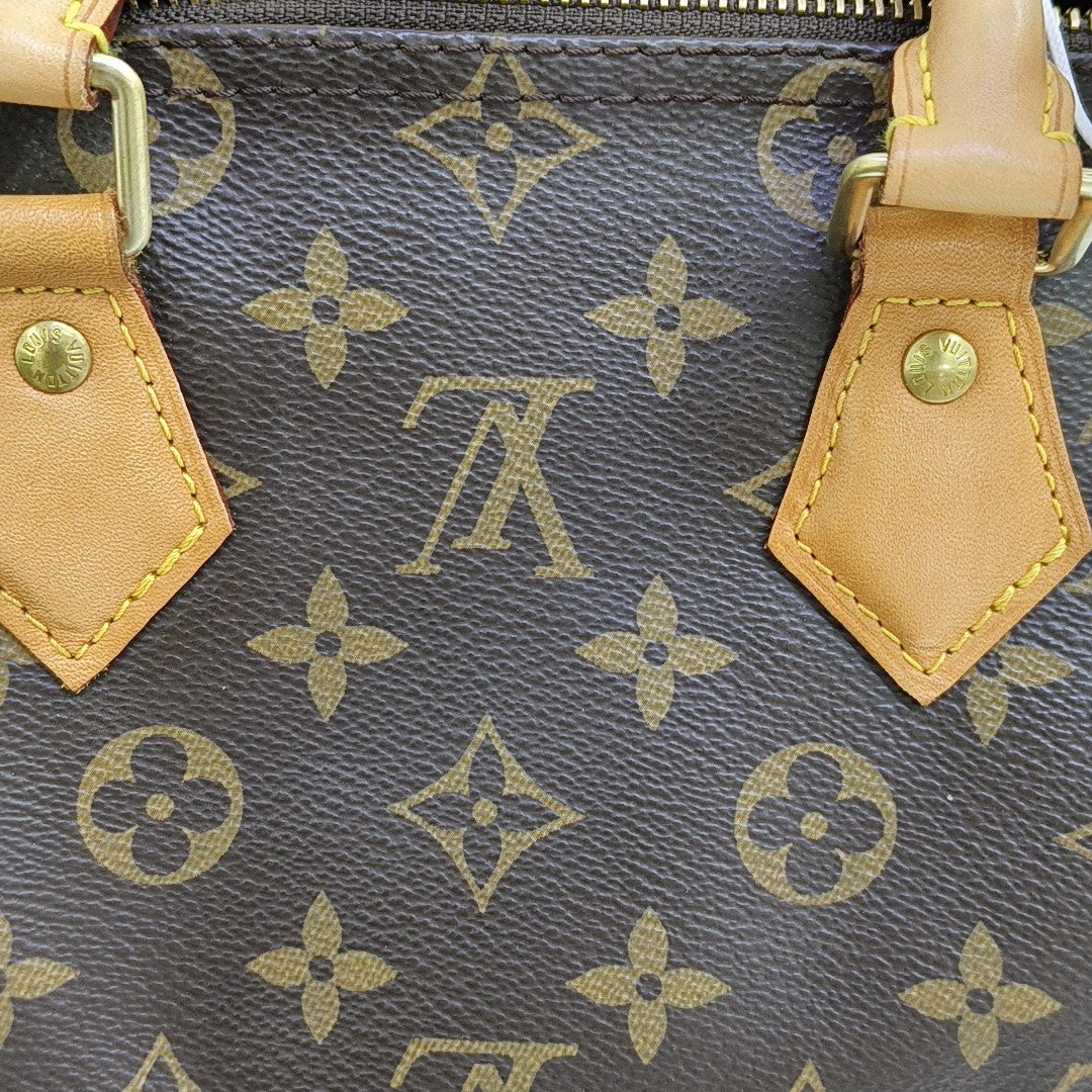 SPEEDY 25 Monogram Coated Canvas Brown