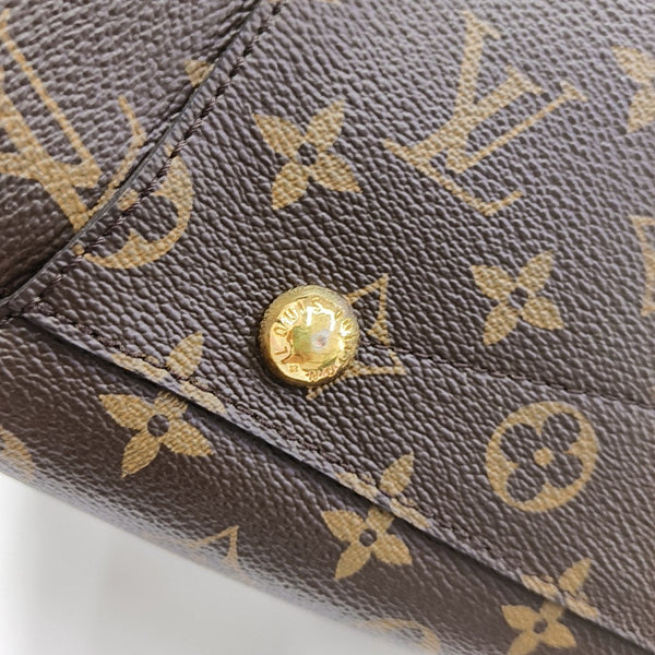 MONTAIGNE GM Monogram Coated Canvas Brown