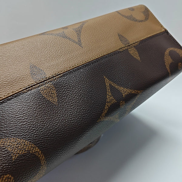 ONTHEGO MM Monogram Coated Canvas Brown