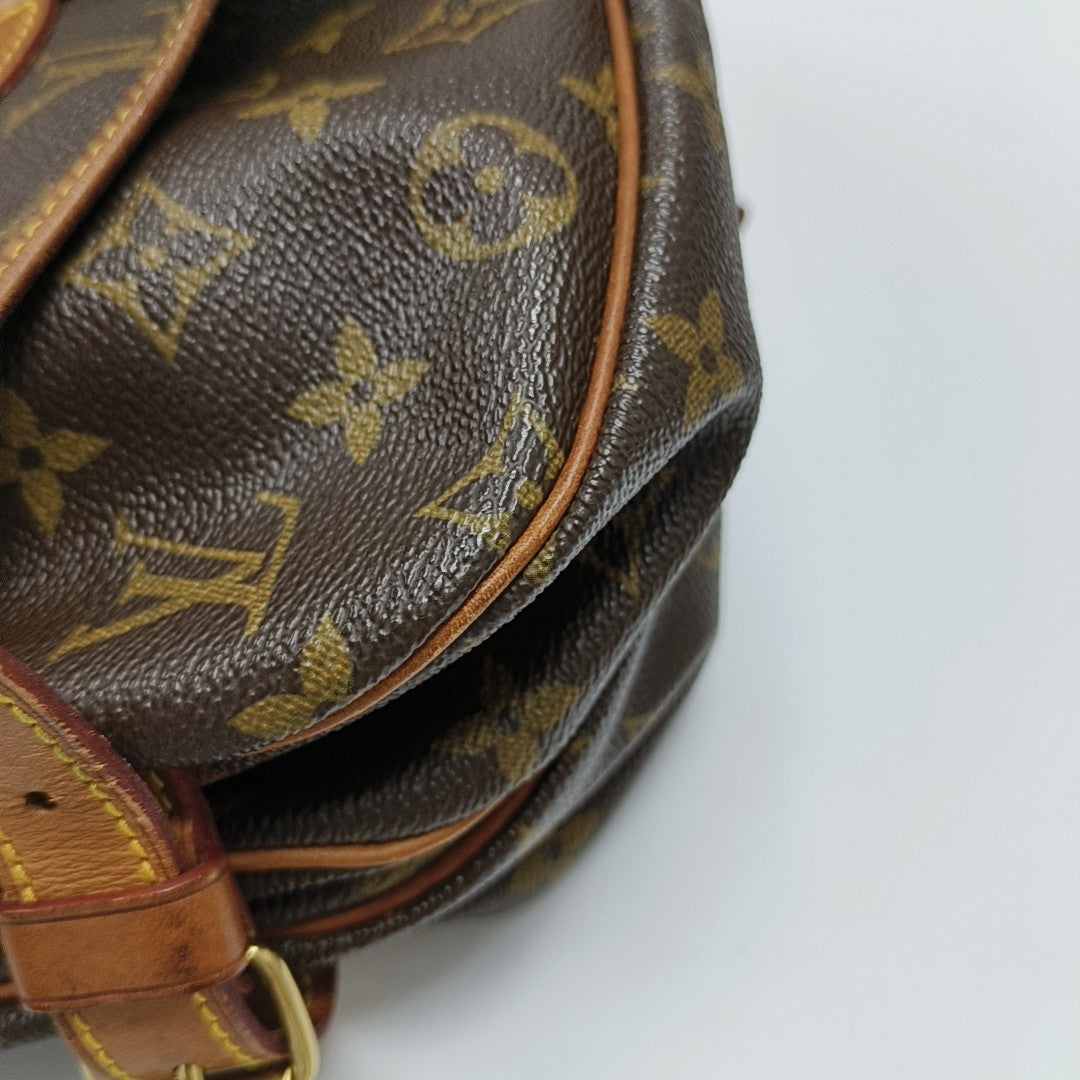 SAUMUR Monogram Coated Canvas Brown
