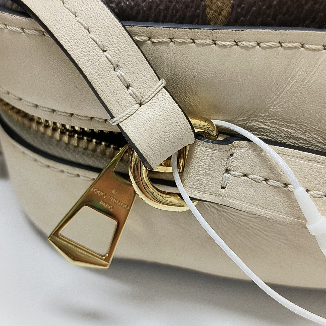 SAINTONGE Monogram Coated Canvas Brown