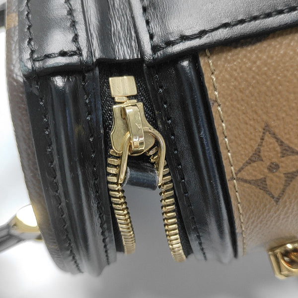 CANNES PM Monogram Coated Canvas Brown