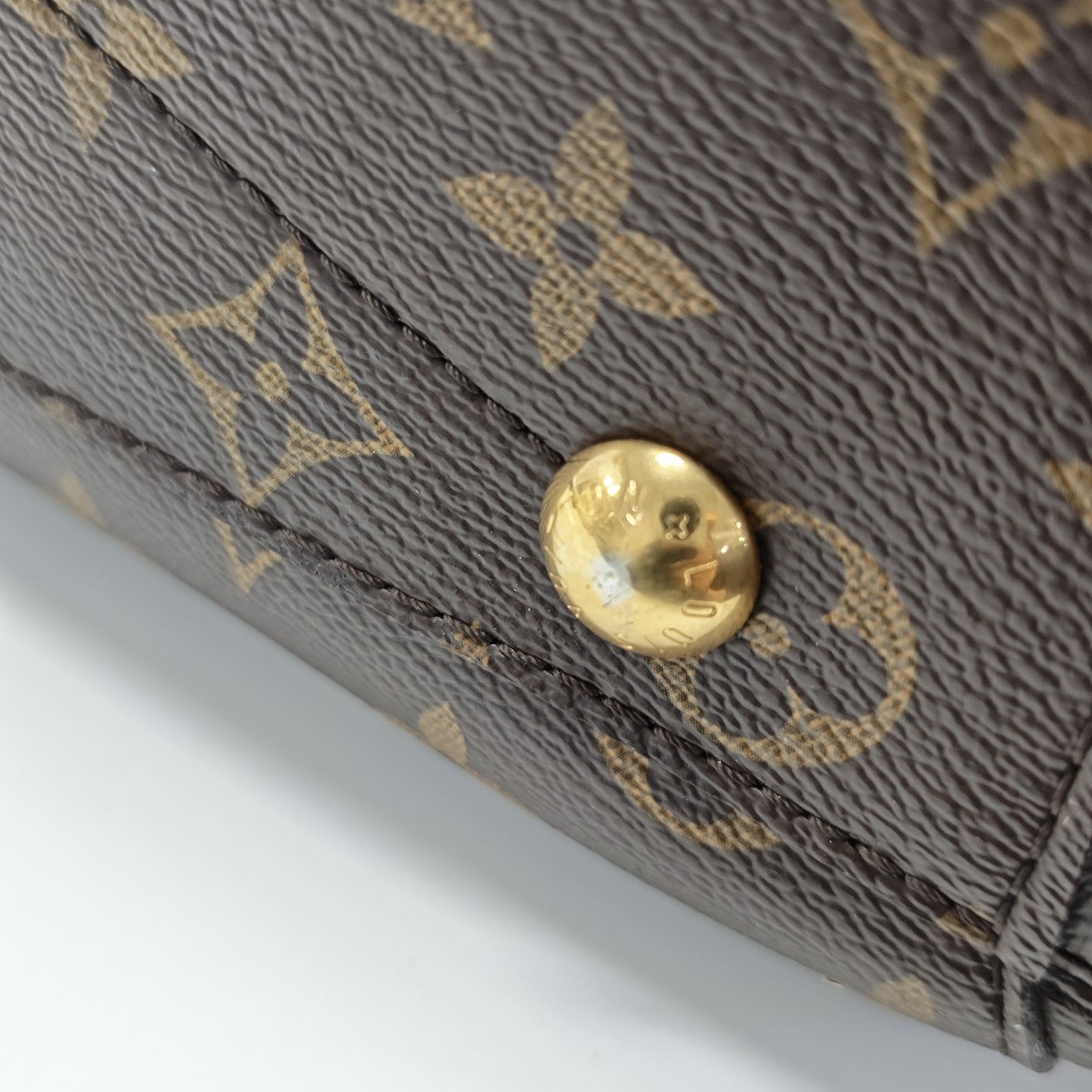 MONTAIGNE Monogram Coated Canvas Brown