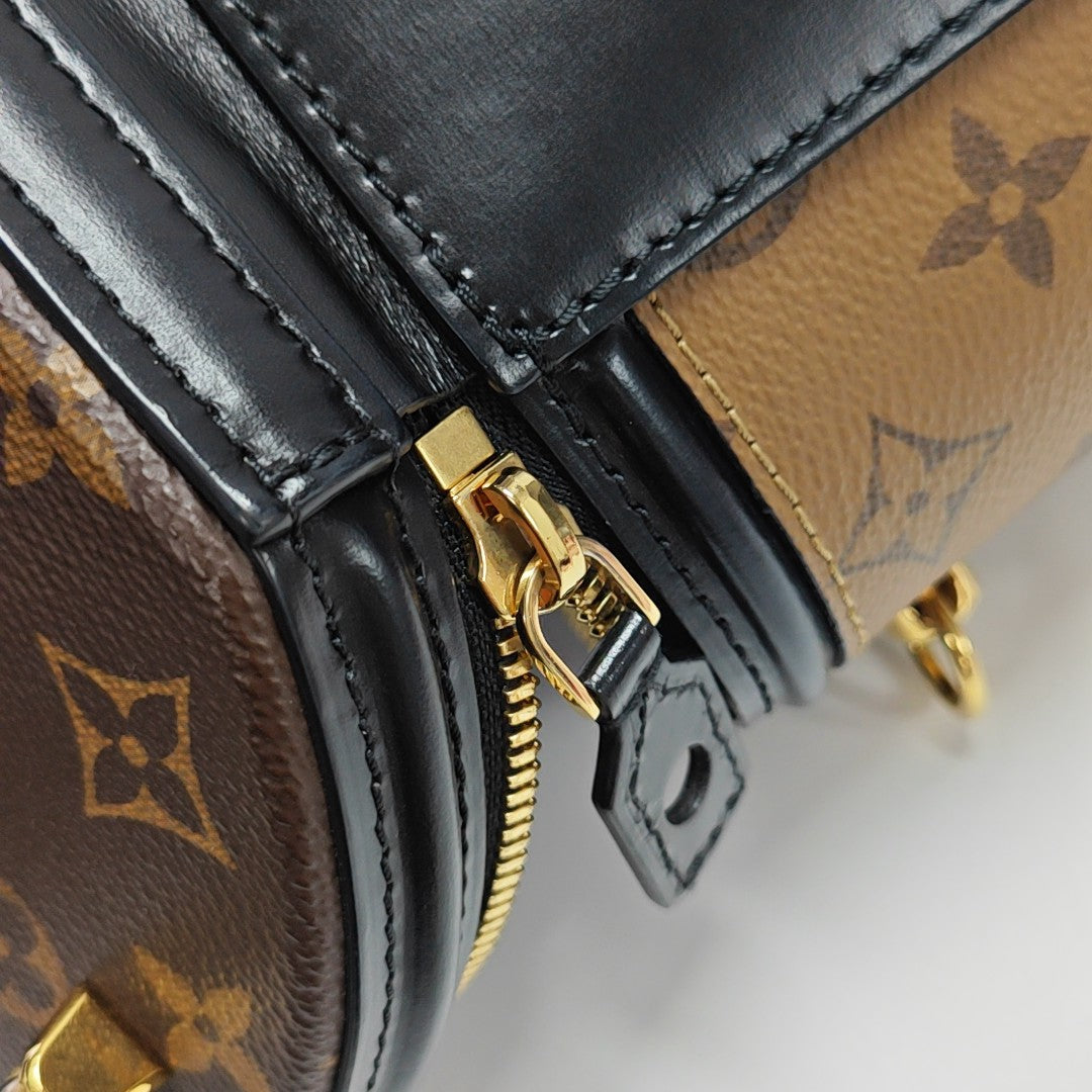 CANNES PM Monogram Coated Canvas Brown