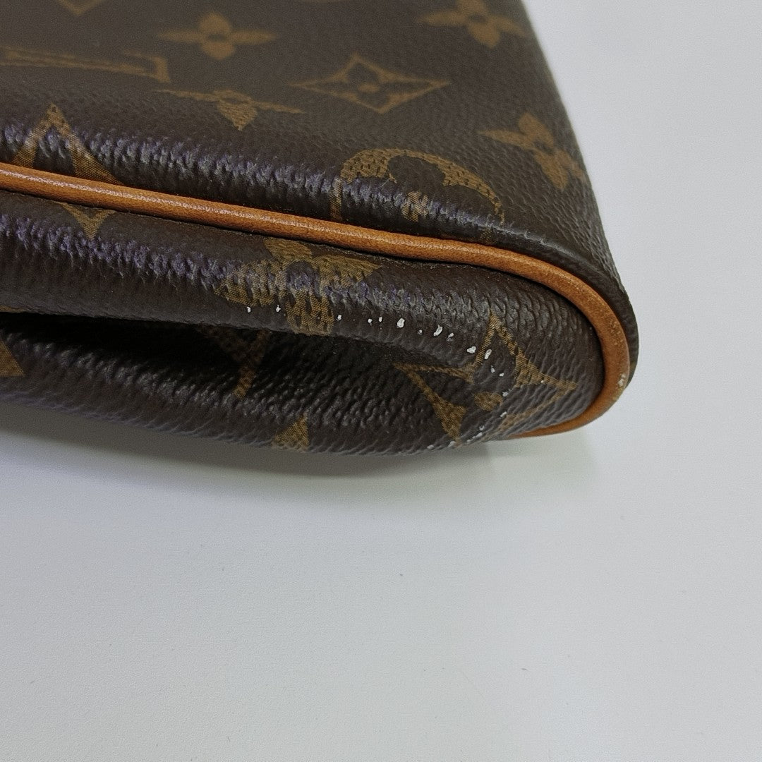 EVA Monogram Coated Canvas Brown