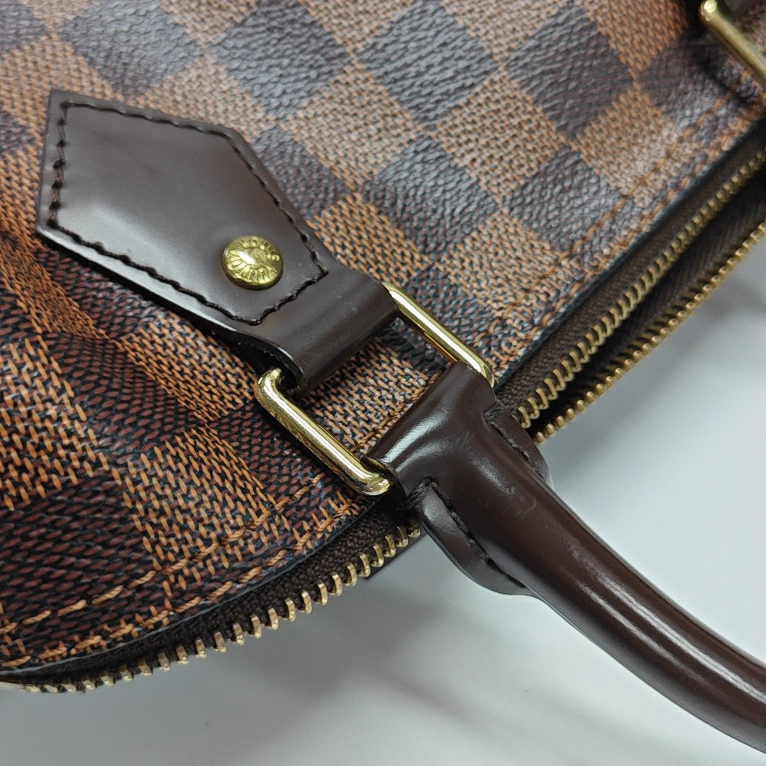 SPEEDY 25 Damier Ebene Coated Canvas Brown