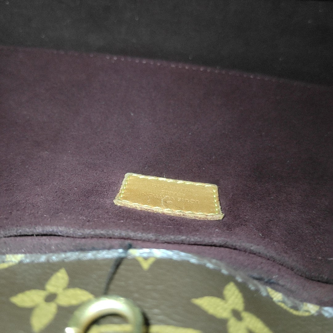 MONTAIGNE Monogram Coated Canvas Brown