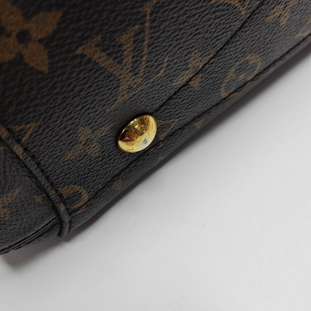MONTAIGNE Monogram Coated Canvas Brown