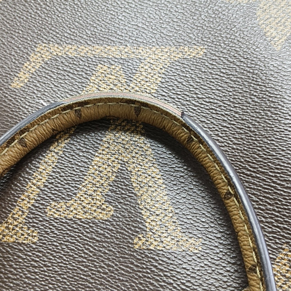 ONTHEGO MM Monogram Coated Canvas Brown