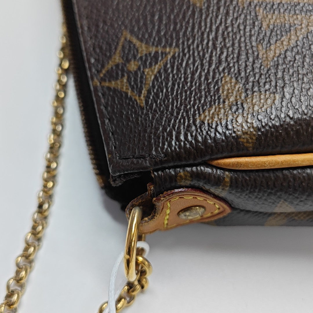 EVA Monogram Coated Canvas Brown