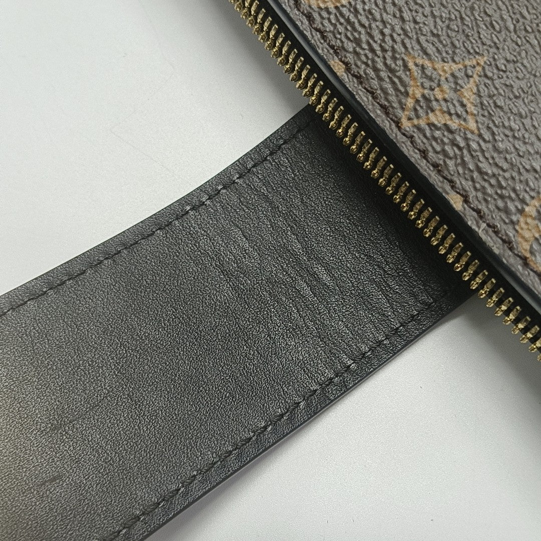 TRUNK Monogram Coated Canvas Brown