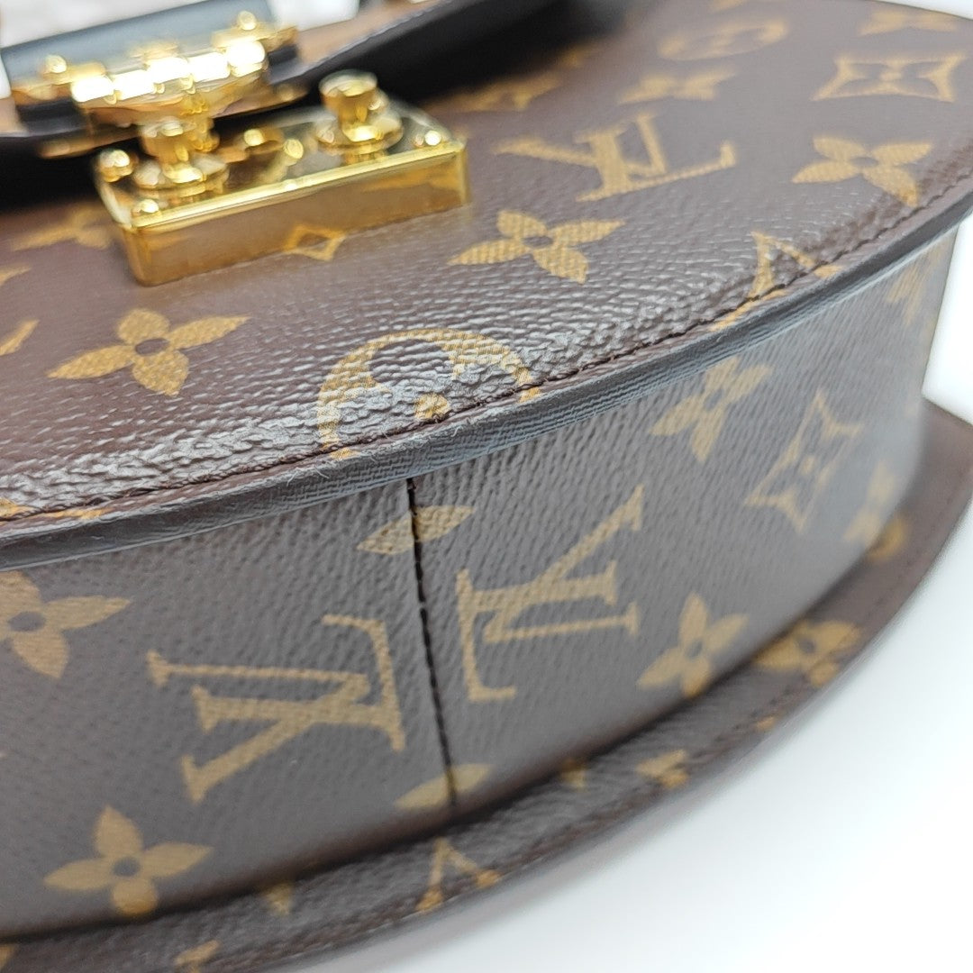 EDEN Monogram Coated Canvas Brown
