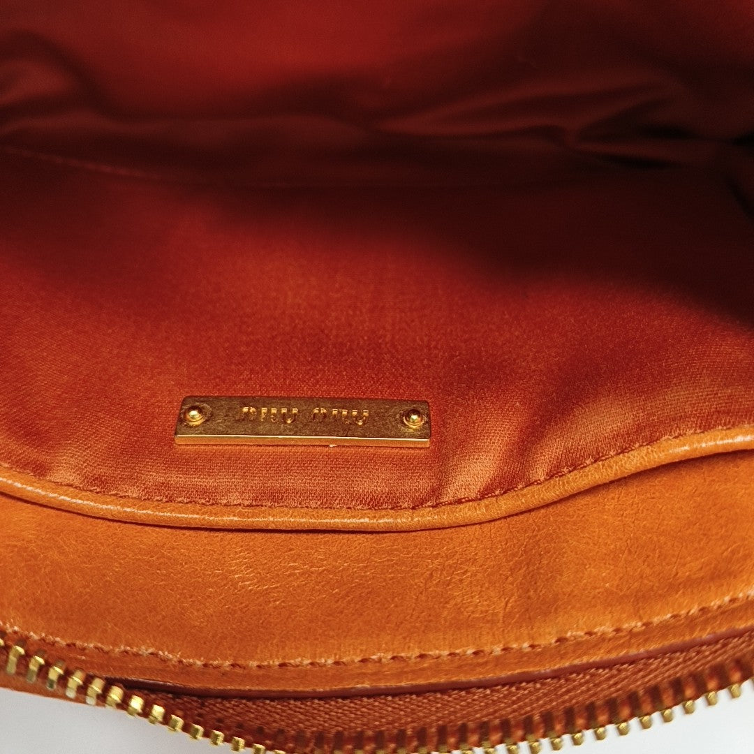 Quilted Lambskin Clutch Orange