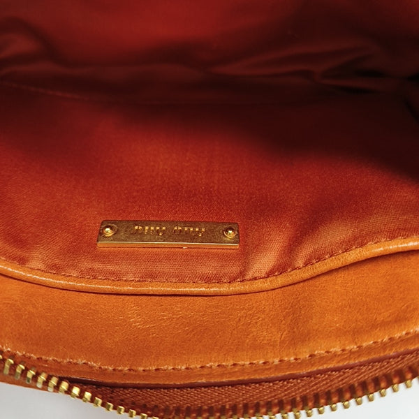 Quilted Lambskin Clutch Orange
