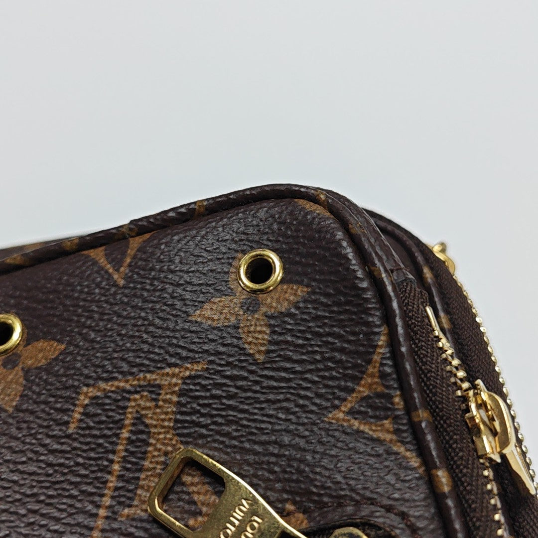 UTILITY Monogram Coated Canvas Brown