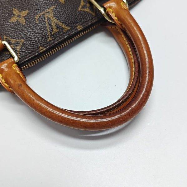 ALMA PM Monogram Coated Canvas Brown