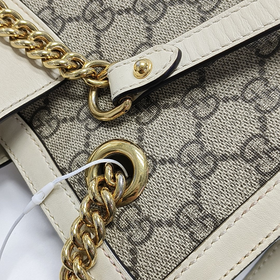Padlock Small Monogram Coated Canvas Beige