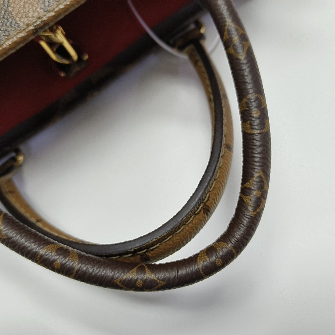 ONTHEGO PM Monogram Coated Canvas Brown