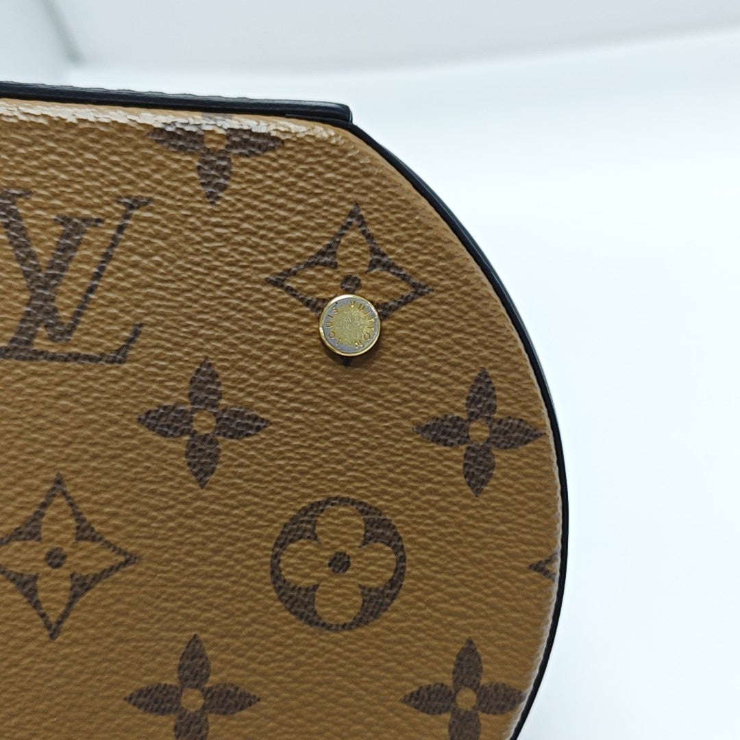 CANNES PM Monogram Coated Canvas Brown