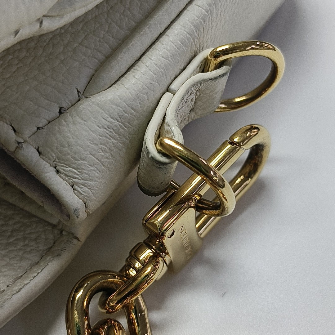 MÉTIS EAST WEST Monogram Calfskin White