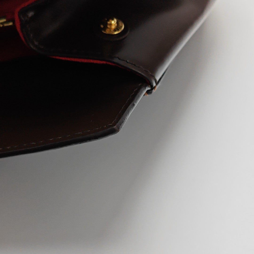 RIVOLI Damier Ebene Coated Canvas Brown