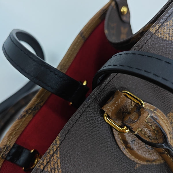 ONTHEGO MM Monogram Coated Canvas Brown