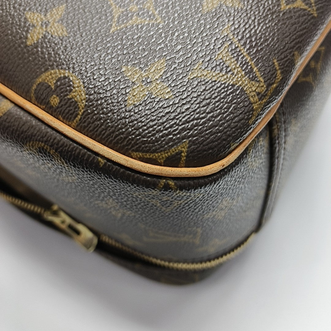 EXCURSION Monogram Coated Canvas Brown