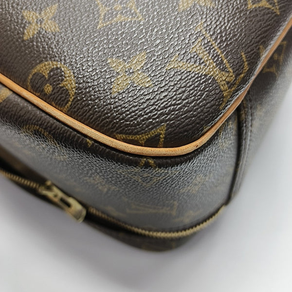EXCURSION Monogram Coated Canvas Brown
