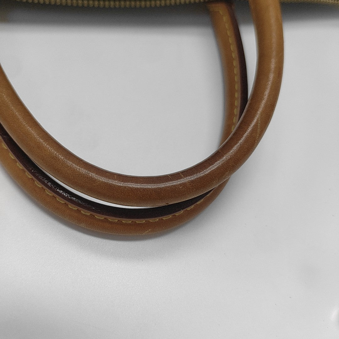 TURENNE Monogram Coated Canvas Brown
