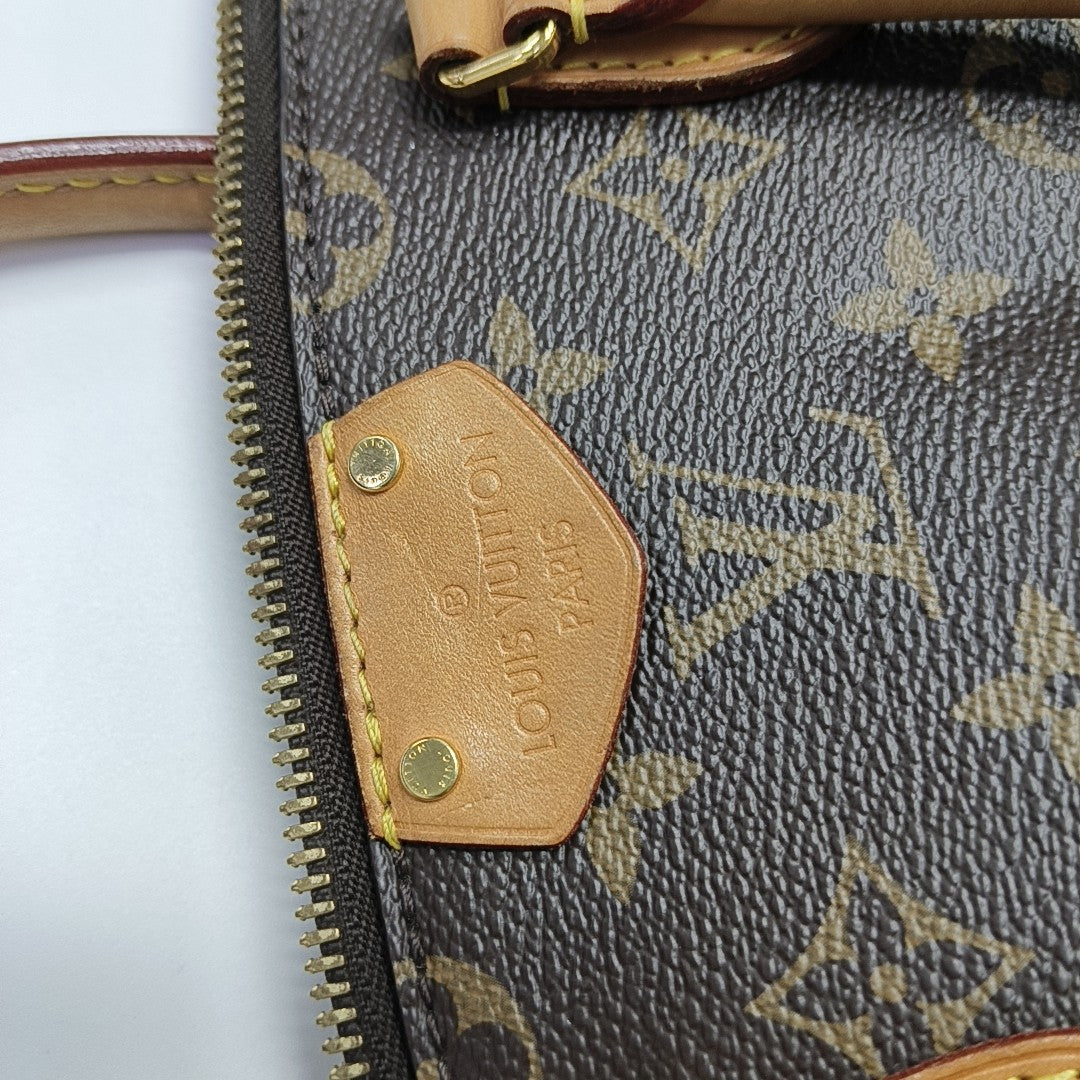 TURENNE Monogram Coated Canvas Brown