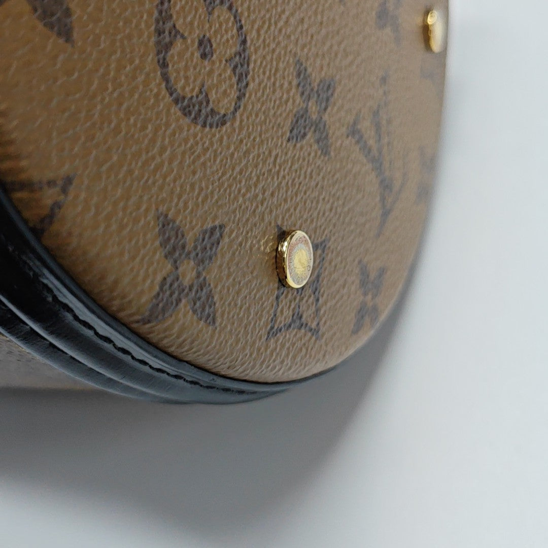CANNES PM Monogram Coated Canvas Brown