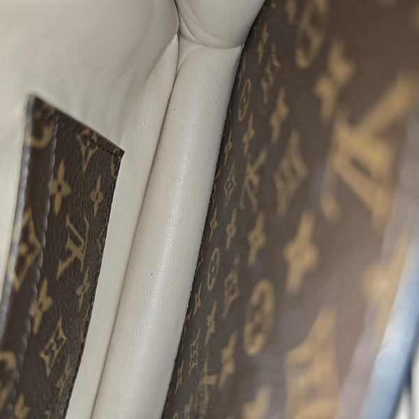 TRUNK Monogram Coated Canvas Brown