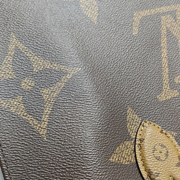 ONTHEGO MM Monogram Coated Canvas Brown