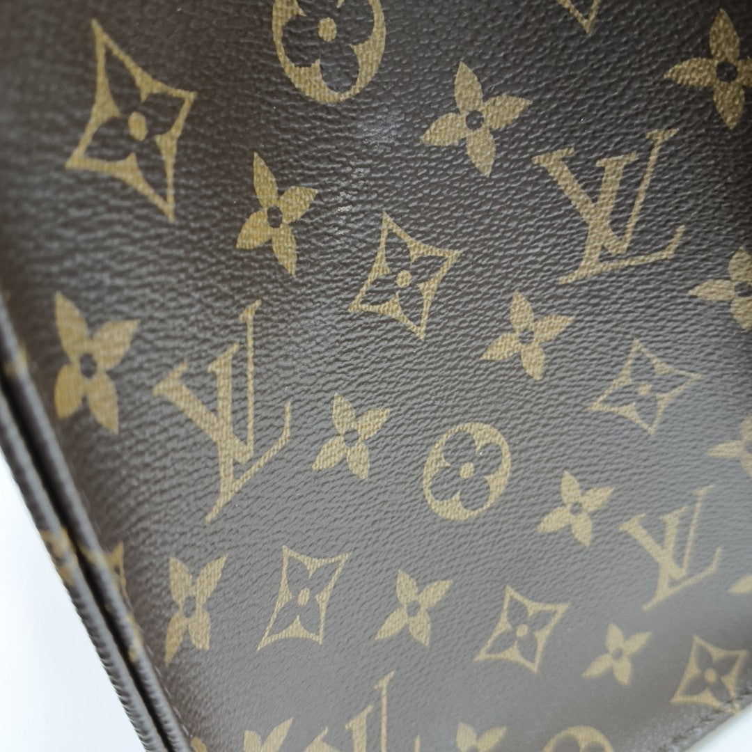 ONTHEGO MM Monogram Coated Canvas Brown