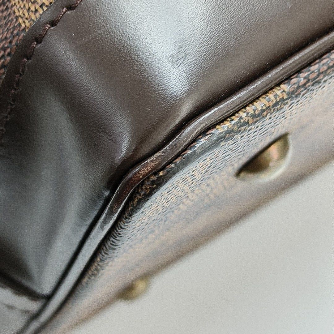 WEST END Damier Ebene Coated Canvas Brown