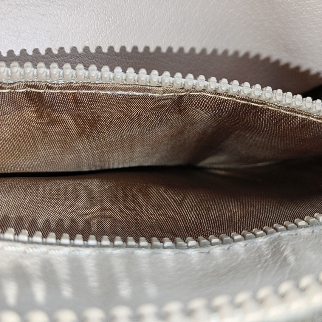 MACADAM CLUTCHES Coated Canvas Beige