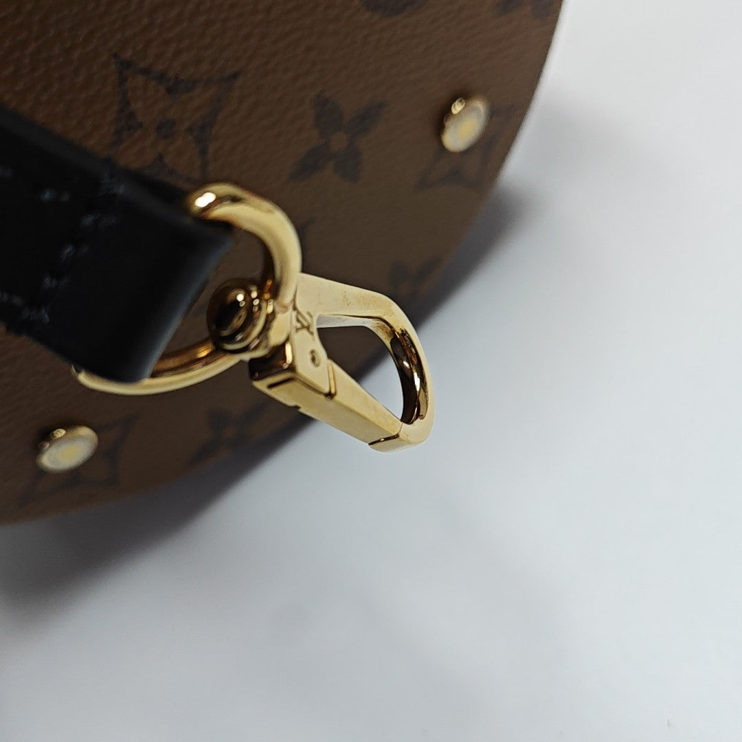 CANNES PM Monogram Coated Canvas Brown