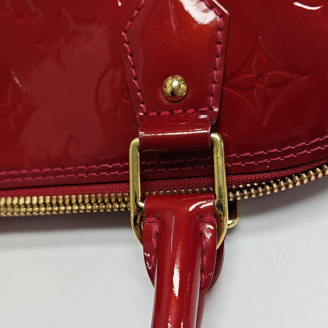 ALMA PM Monogram Patent Leather Red