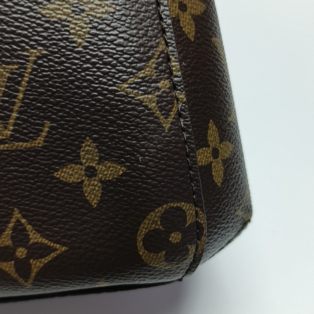 MONTAIGNE Monogram Coated Canvas Brown