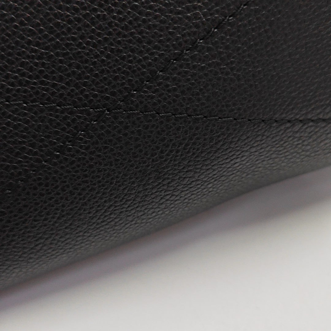SAUMUR Monogram Coated Canvas Black