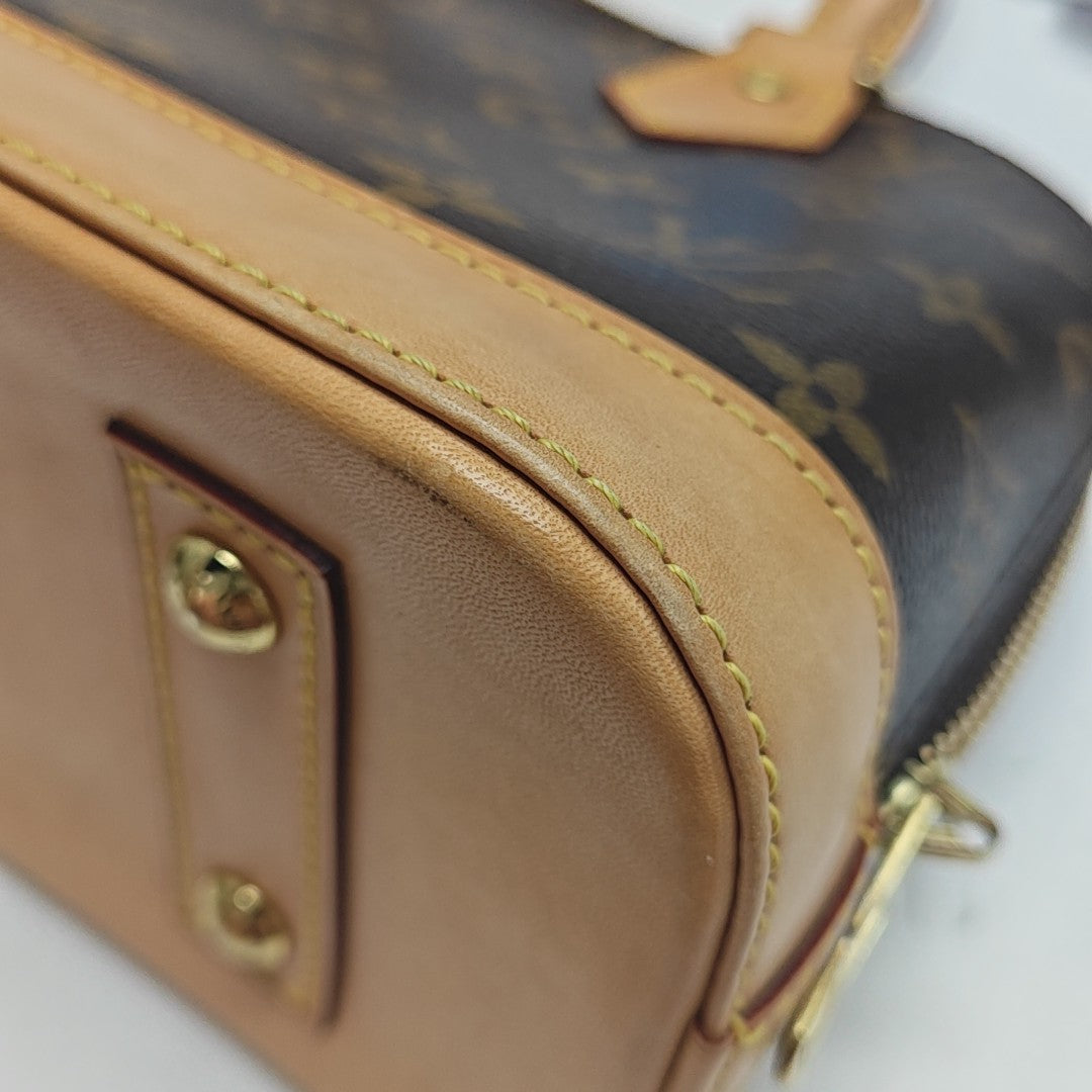 ALMA BB Monogram Coated Canvas Brown
