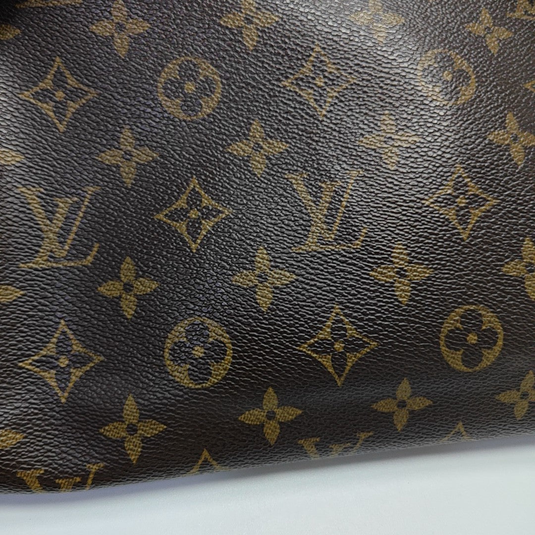 LOOPING PM Monogram Coated Canvas Brown