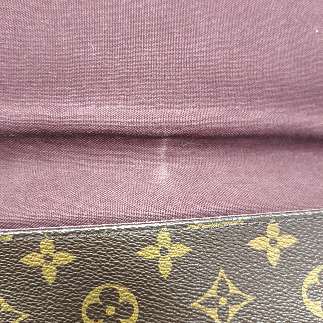 BASS Monogram Coated Canvas Brown