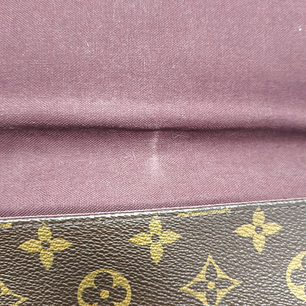 BASS Monogram Coated Canvas Brown