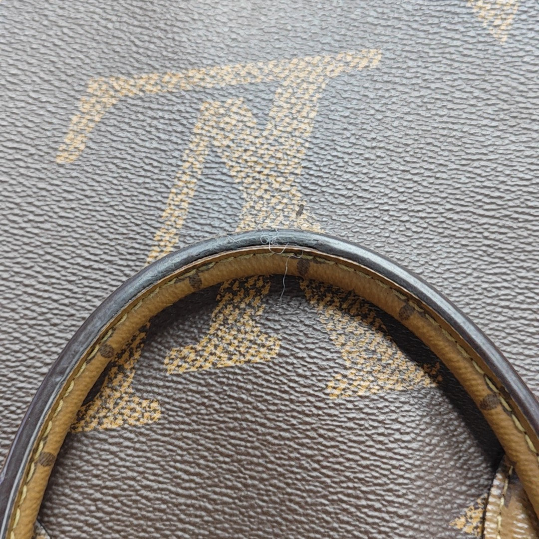 ONTHEGO MM Monogram Coated Canvas Brown