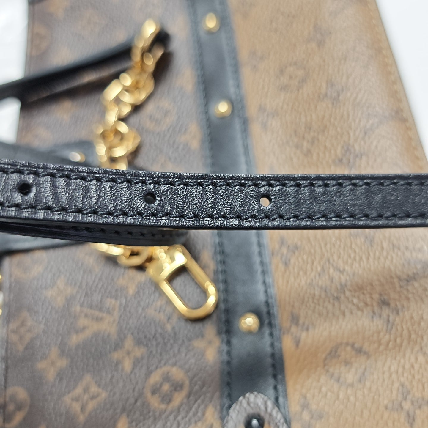 TRUNK Monogram Coated Canvas Brown