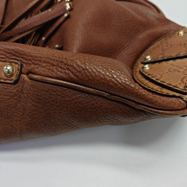 Indy Monogram Calfskin Brown